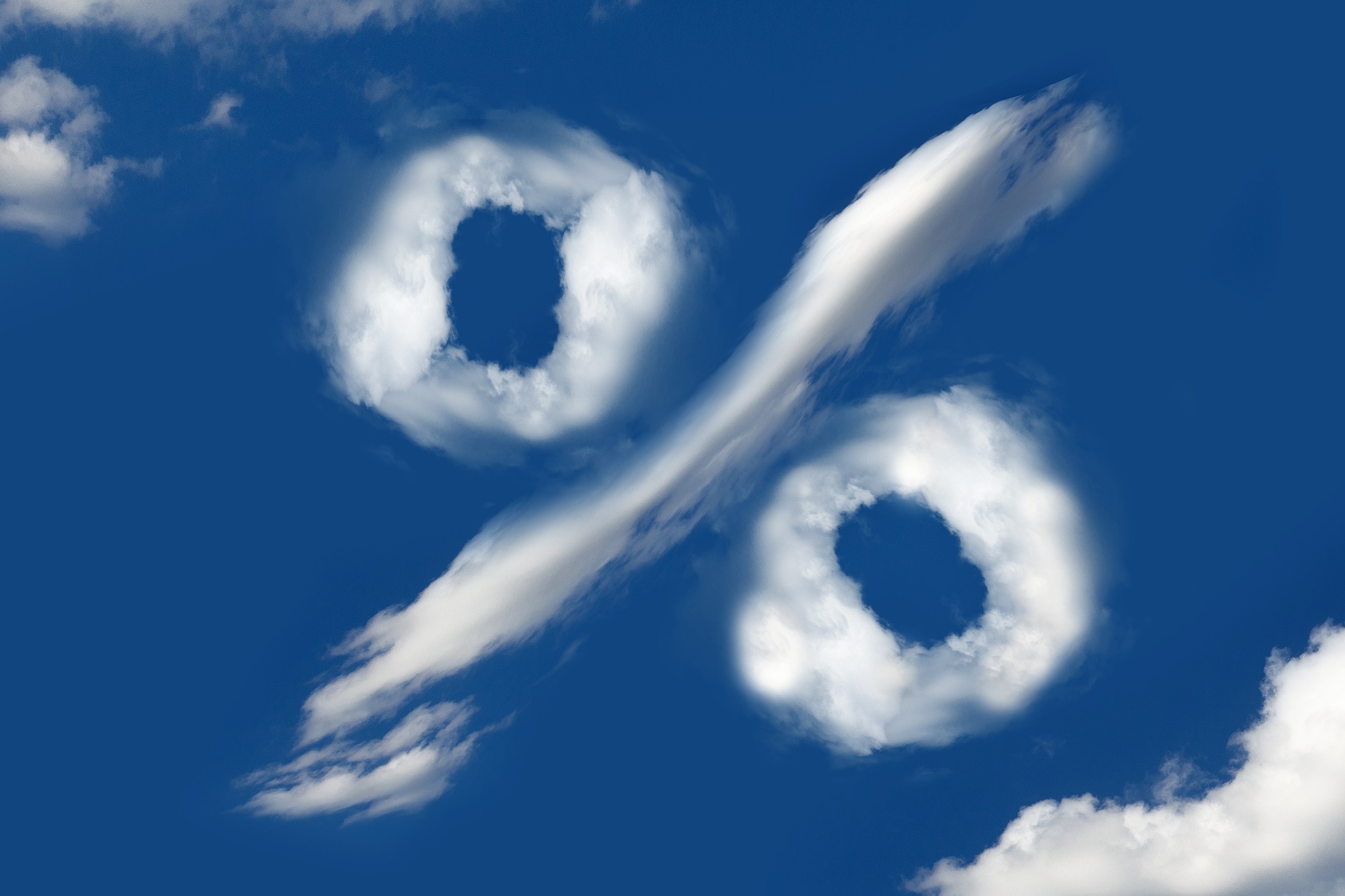 abstract image of clouds shaped like a percentage sign