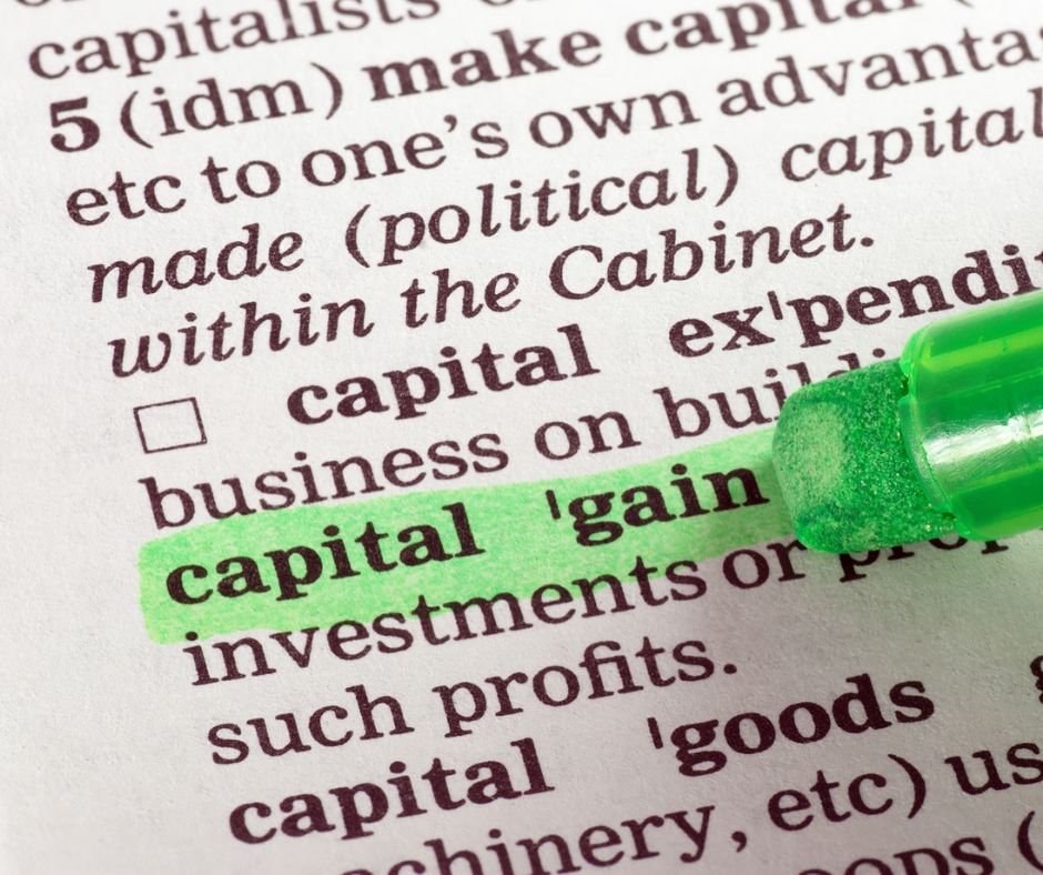 dictionary with words "capital gains" highlighted